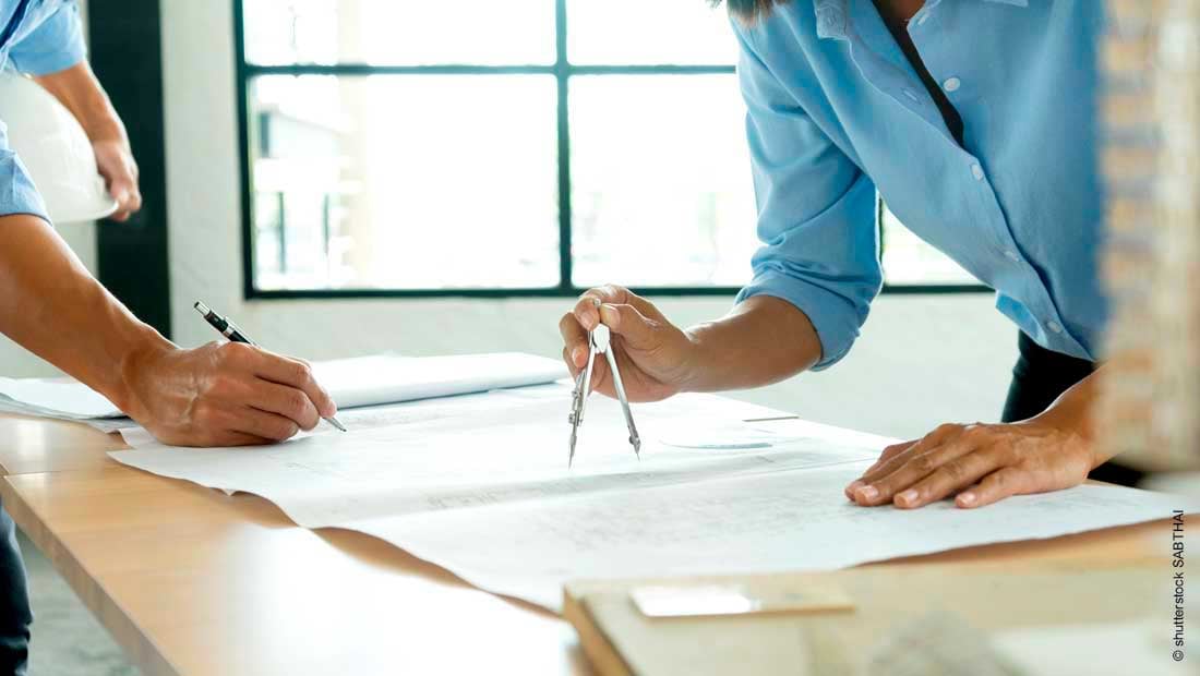 architect-or-engineer-working-on-table_shutterstock_mit_©_sabthai_1889239114_1100x620px_220105